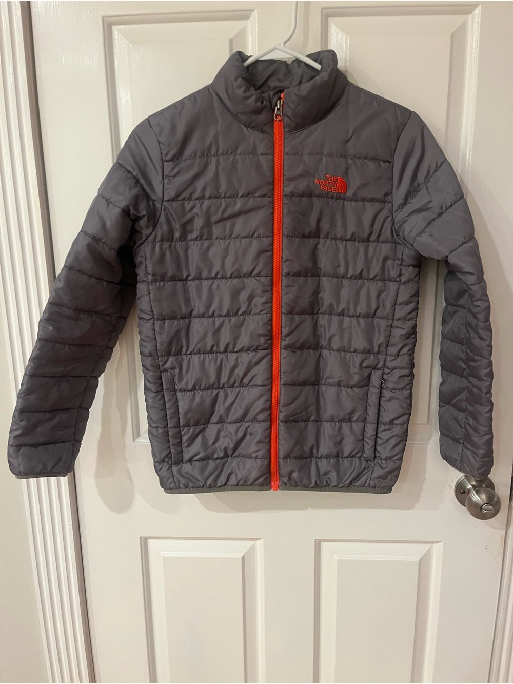 The North Face Kids Gray Puffer Jacket with Orange Zipper